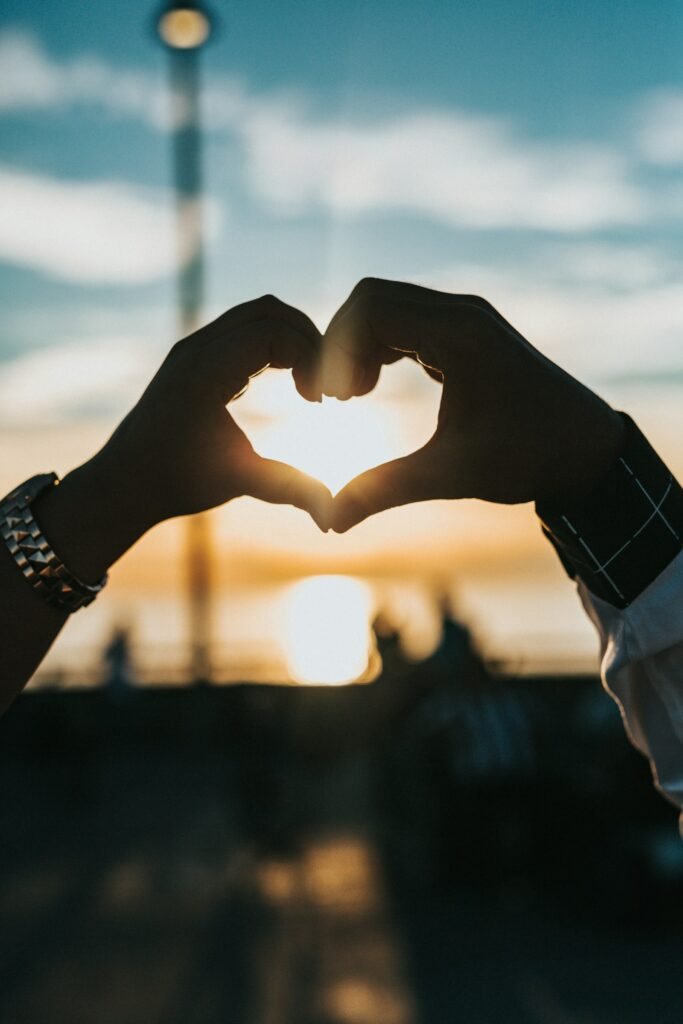 Two people holding hands, representing adult attachment styles